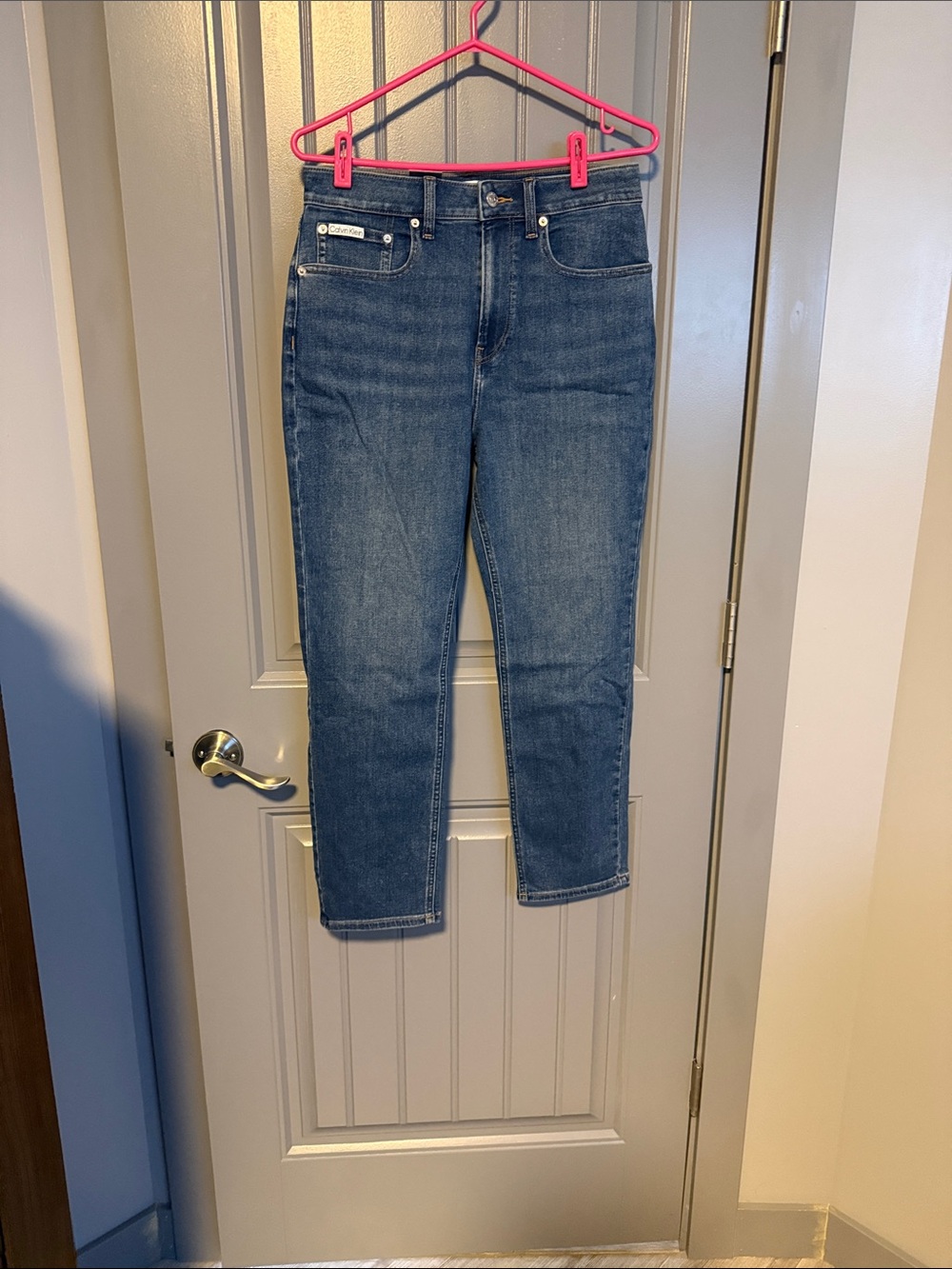 Calvin Klein High-Rise Straight Jeans in Mid Blue